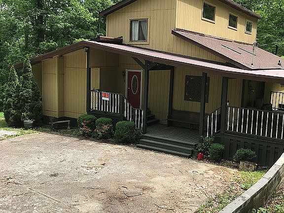 Front, wrap around deck.