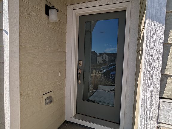 Front door with keyless entry and frosted glass for privacy