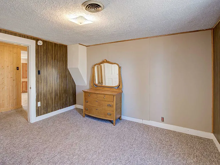 Along the north side, midway down the center hall is bedroom #2. Some existing furniture may be available if desired by tenant.