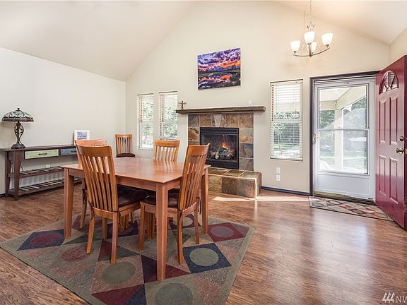 Spacious dining room with gorgeous gas fireplace