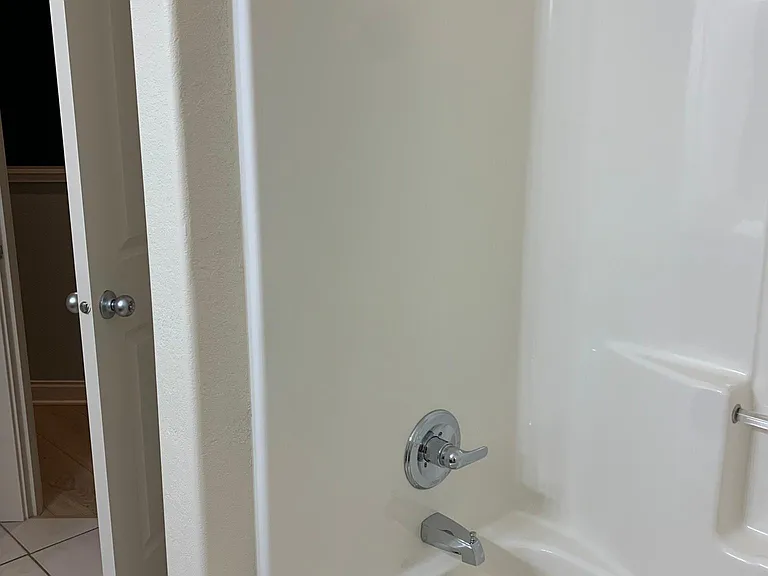 Bath and shower in one of two full bathrooms.