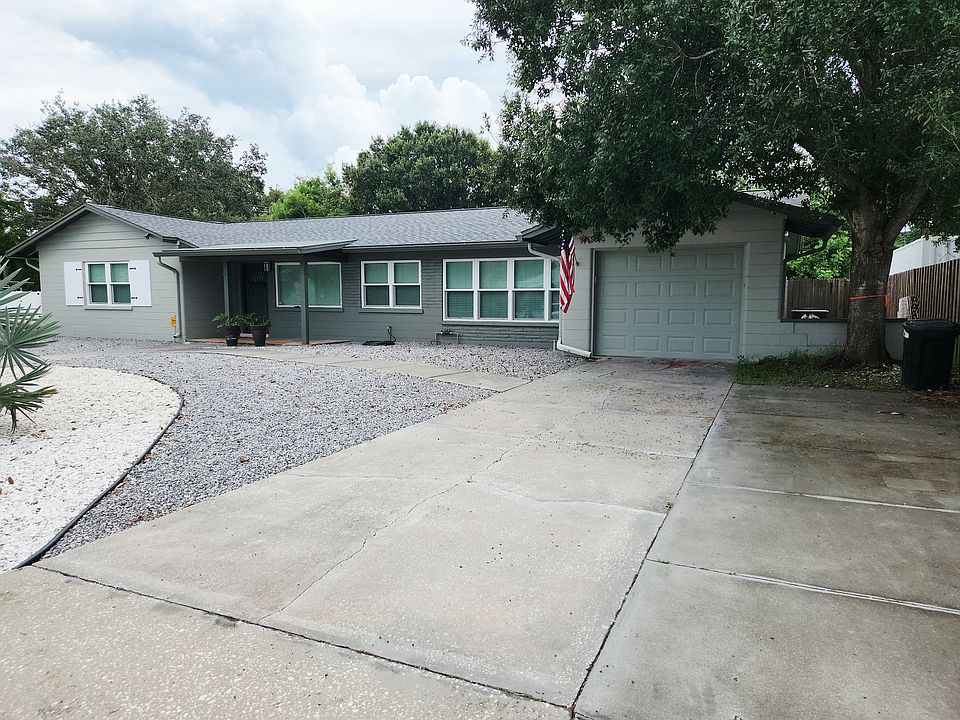 This property includes a one-car garage that serves multiple purposes, providing ample space for storage needs, a dedicated area for a workbench, and conveniently houses the washer and dryer, offering practicality and functionality. No Car access.