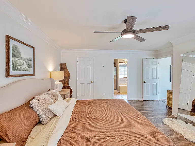 Massive master bedroom with king bed, Casper cooling foam pillows, and linens