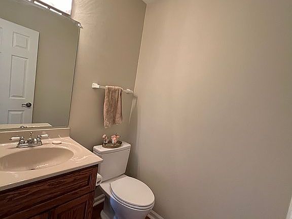 1/2 bath right of entrance