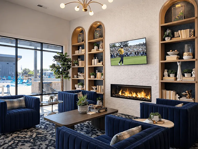 Inviting resident clubhouse with comfortable lounge seating, designed for connection and everyday relaxation.