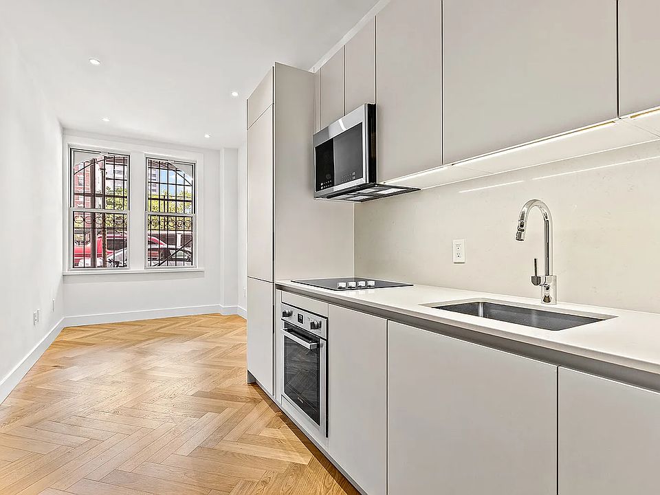 1st image of 301 E 21st St APT 1A