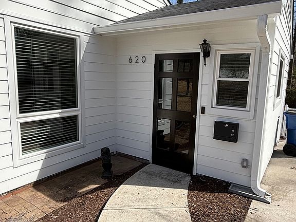 Front Door with Screen Door and Mailbox with Key lock