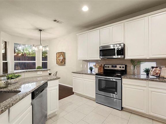 Gorgeous new Gray Granite Countertops and Subway Tile Backsplash