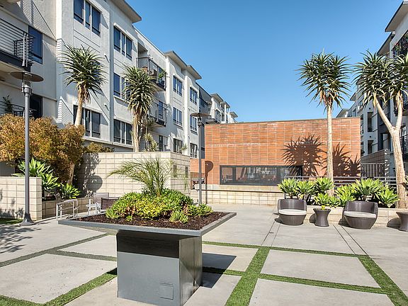 Courtyard with outdoor fireplace.