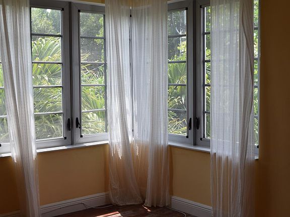 Bedroom with large closet and bay window.