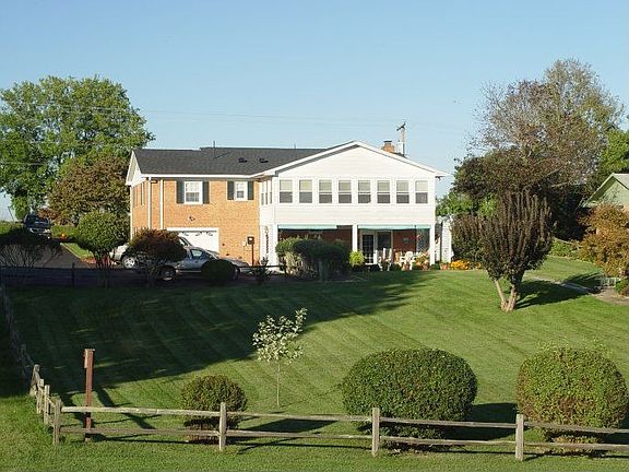Sunroom Overlooks Lawn and Views