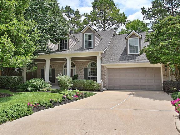 Extraordinary 2-Story David Weekley Home in Gated Community on a nearly 1/3 Acre Cul-de-sac Lot with Sparkling Salt Water Pool and Waterfall!