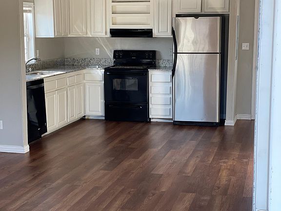 Kitchen with granite countertops