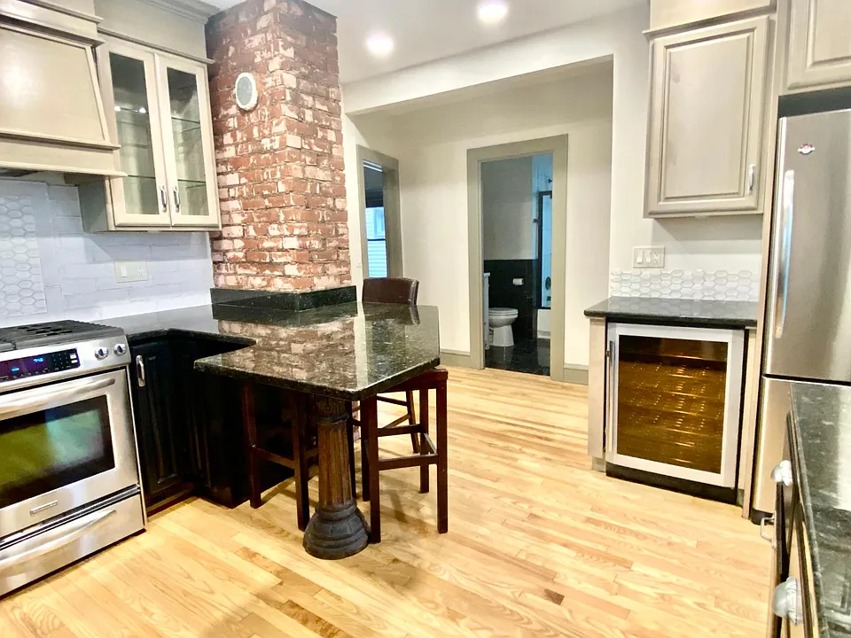 Stainless appliances including dishwasher and built-in wine cooler