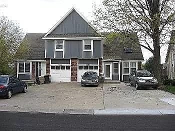 Three independent driveways.. Front entrance vestibule (mud room/mail package delivery) has two inside entrances : one to enter main house and second to enter garage.