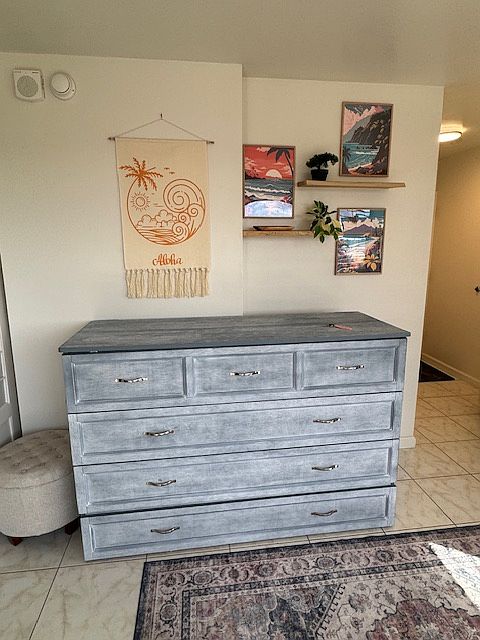 Queen size Murphy bed in living room.