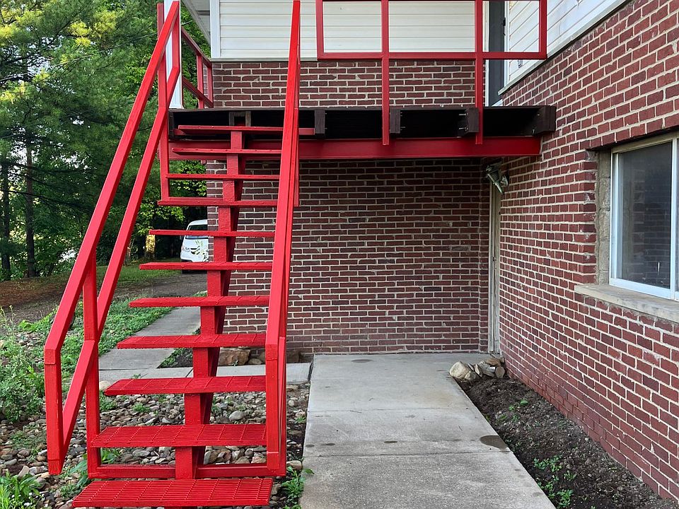 Front entrance and porch. Note area for planting flowers.