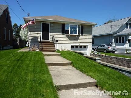 Front Yard
						:
						Great house on quiet street, in the middle of everything.