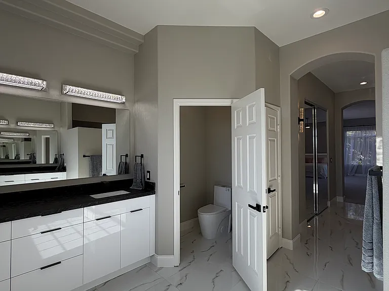 Spacious primary bath with a separate private water closet