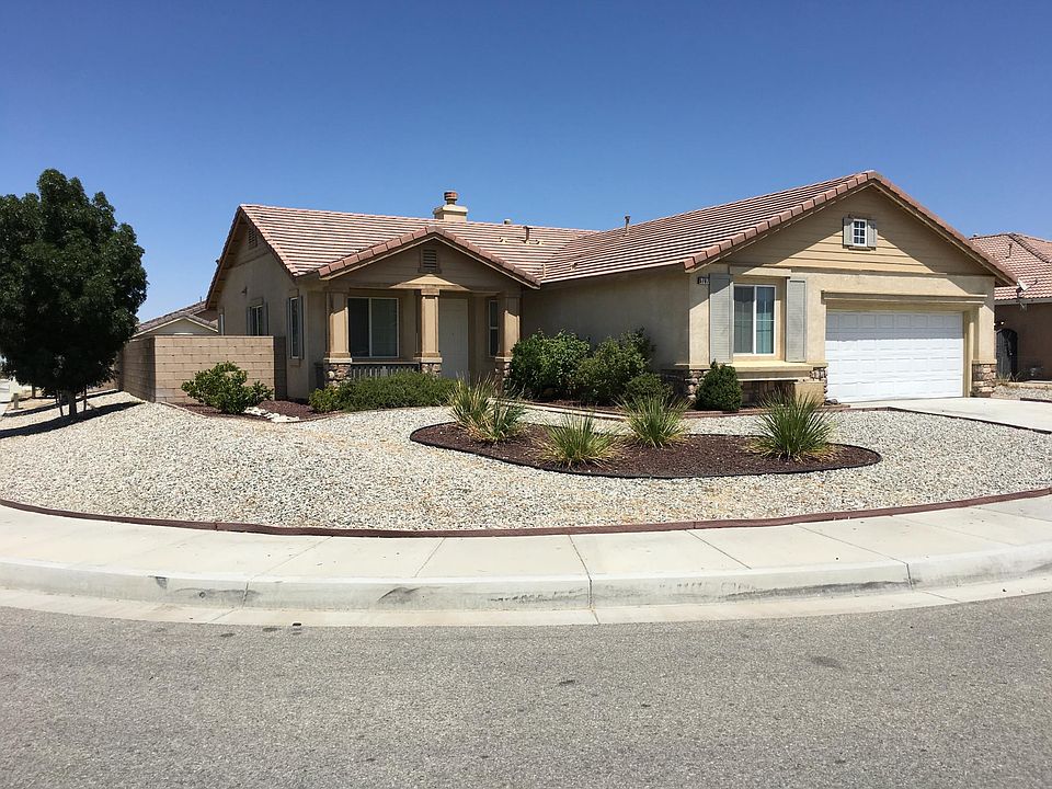 Beautiful corner property with low maintenance landscaping