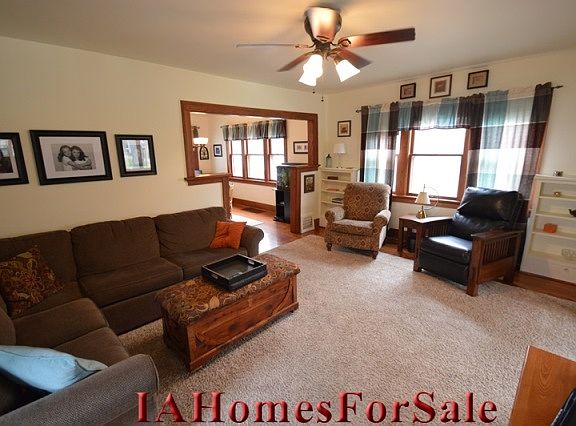 Living Room - Tons of south facing windows flood the main floor with natural light.