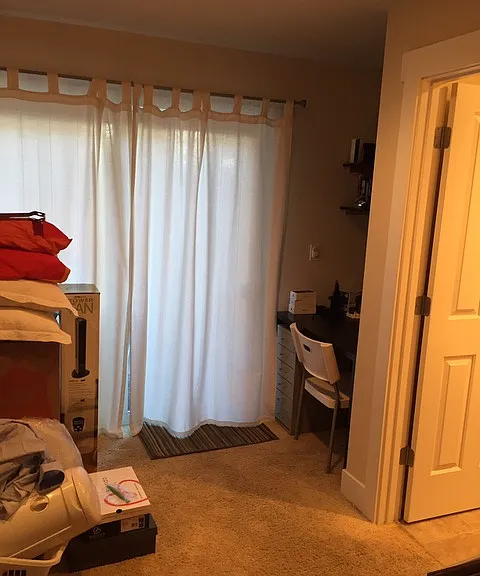 Lower level bedroom with access to backyard