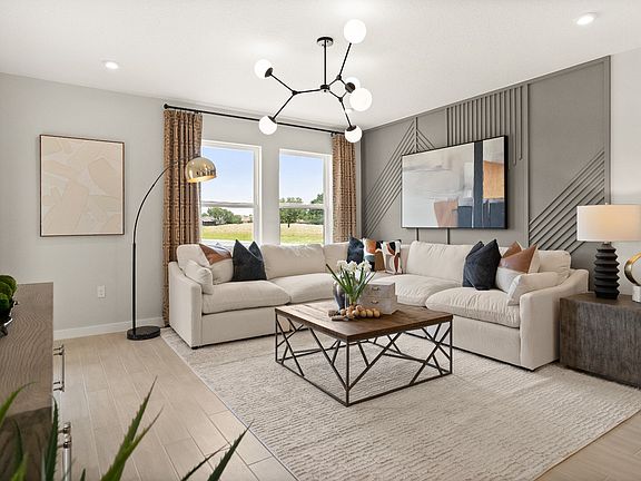 Spacious Living Room of a new construction DRB Homes Jupiter Model at Grasslands West in Lakeland, F