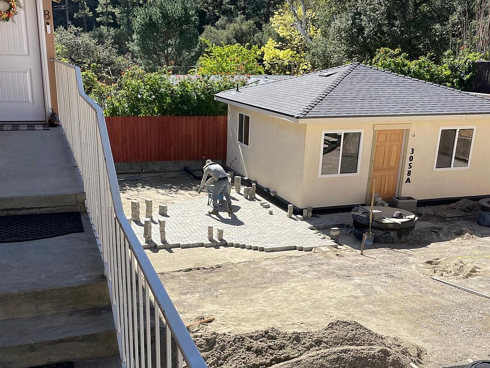 off-white house with black roof house is 95% completed new pavers are put in as seen in photo be the first one to live in this one bed one bath adu