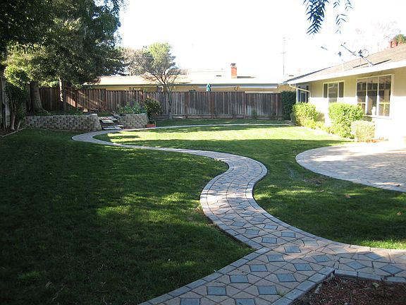 Stunning backyard with over 4,000 sf of play area!