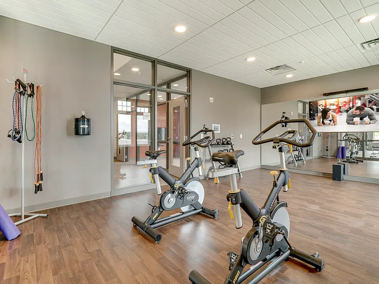 Take an on-demand fitness class in our yoga and spin studio.