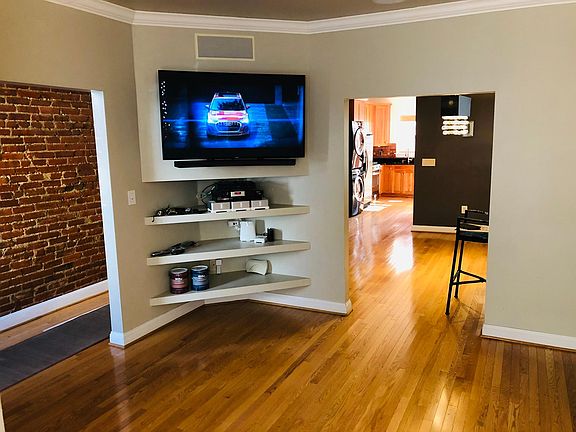 View of living room with mounted 55" Samsung TV (only 18 months old)
