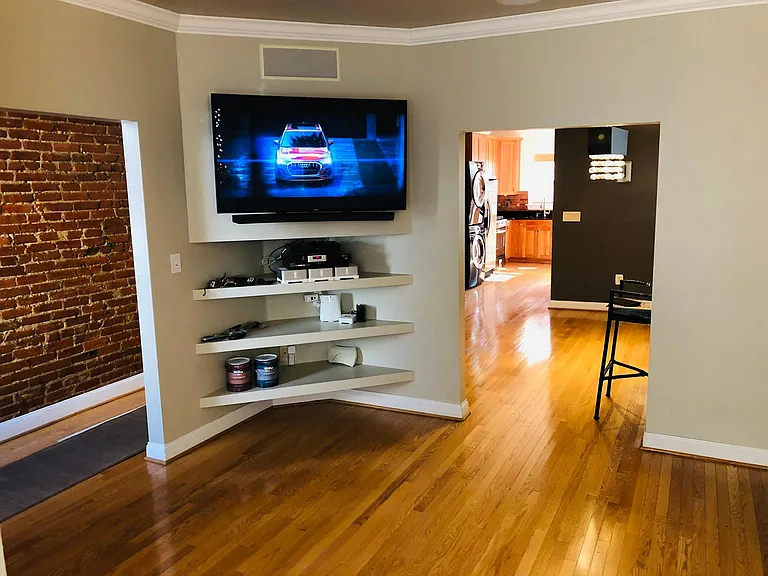 View of living room with mounted 55" Samsung TV (only 18 months old)