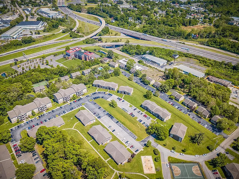 Explore modern living with this well-connected, green-surrounded apartment complex.
