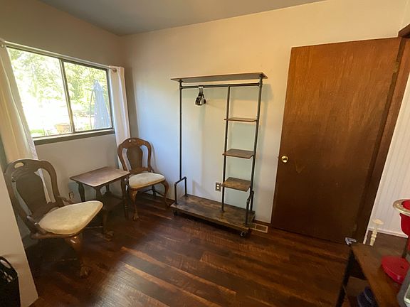 Sitting area and Clothes Rack