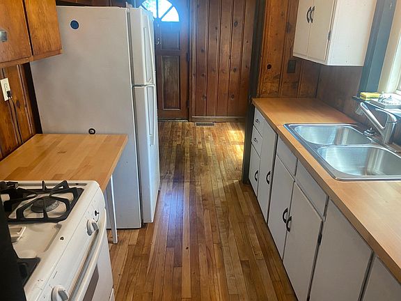 Completely updated kitchen with new butcher block counters and sink