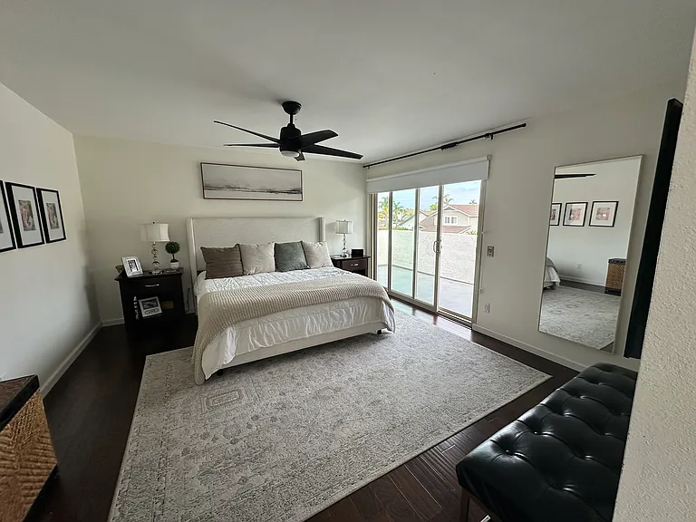 Master Bedroom- It has a patio .