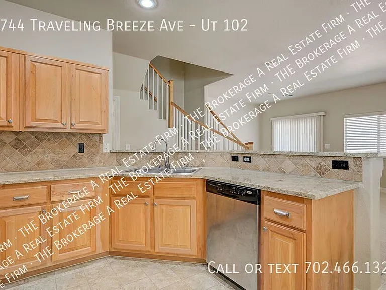 8744 Traveling Breeze Ave #102 — Photo 16