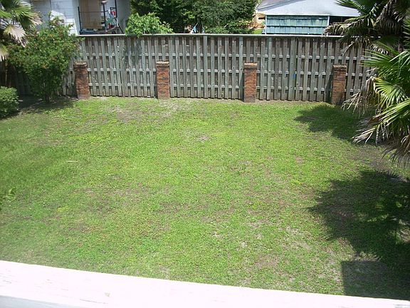 Private Side Yard , Detached Garage in Back , too