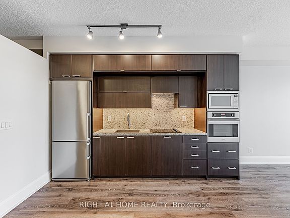 5th image of 120 Harrison Garden Blvd #521