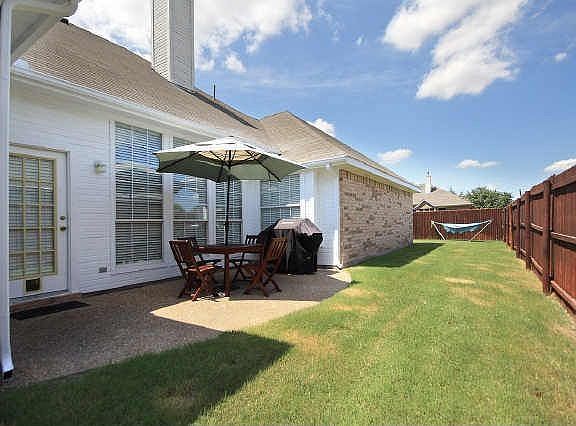 Great side porch for grilling and entertaining.