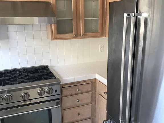 Blue Star range, hood, and KitchenAid french door bottom-fre