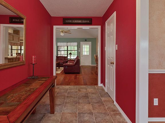 As you step into the warm entry way, notice the tile floors.