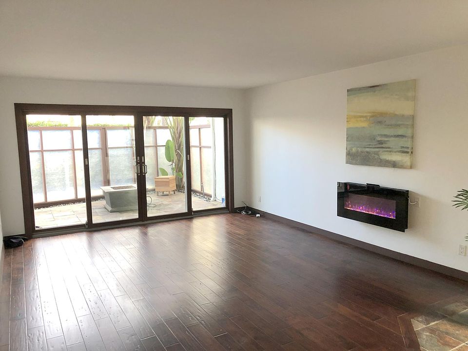 Living Room/Attached Patio/Electric Fireplace