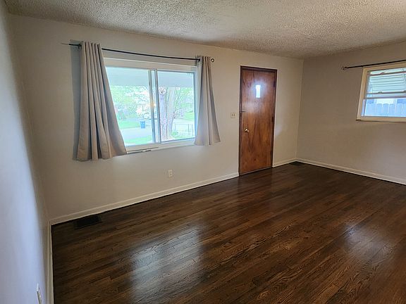 Living Room With Refinished Hardwood Floors