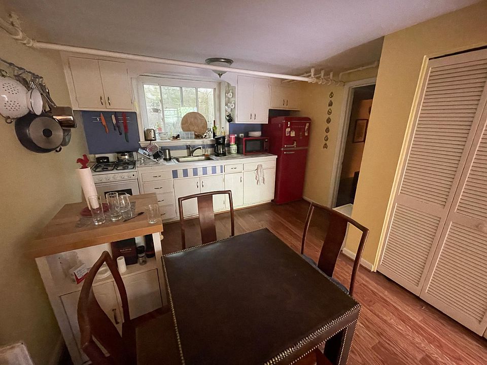Small dining room table and basic kitchen accessories included; new Galanz fridge