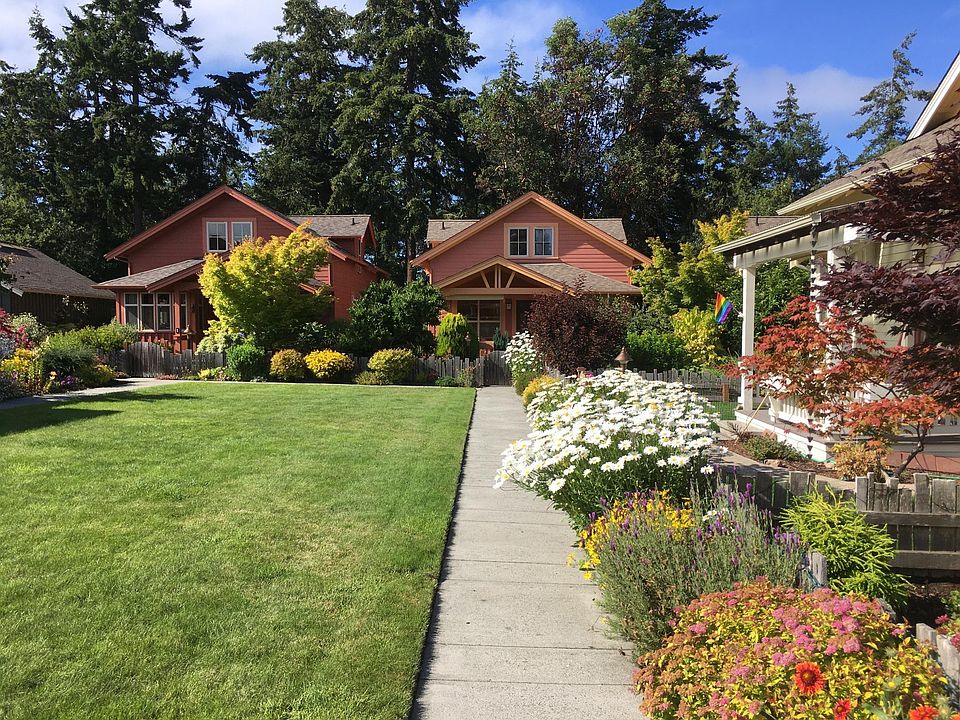 The cottage (at the end of the sidewalk) is located at the far end of the community. You have a designated parking space near the home.