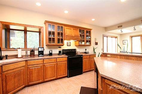 Kitchen w/ Custom Oak Cabinets