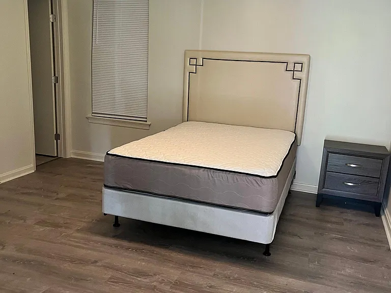Room B - Bed, nightstand, bathroom entrance, external access from outside with disability ramp if needed