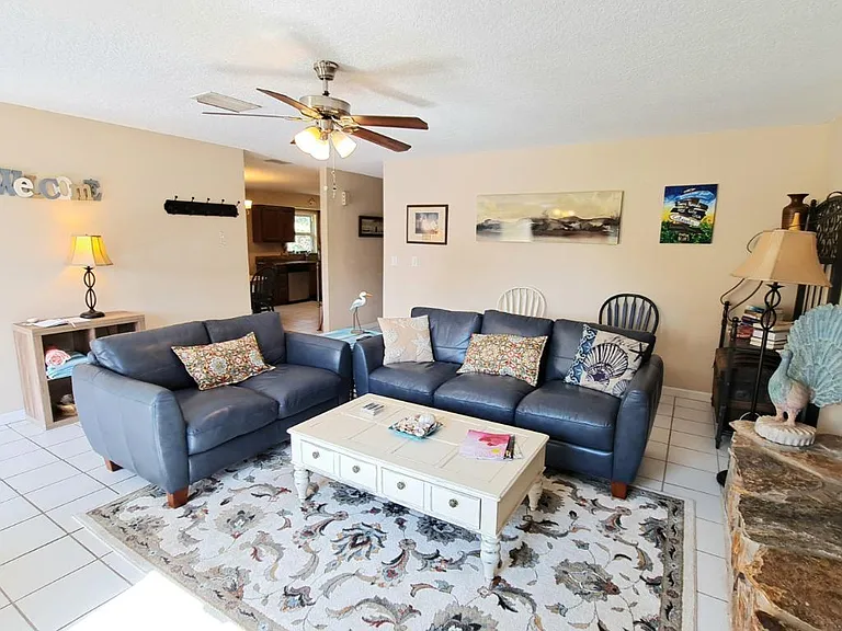 Living Room with Sofa, Love Seat and Flat Screen TV