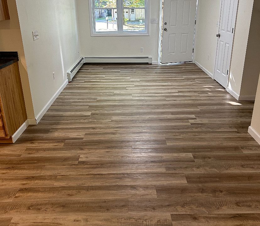 Showing front entrance with closet and open floor plan